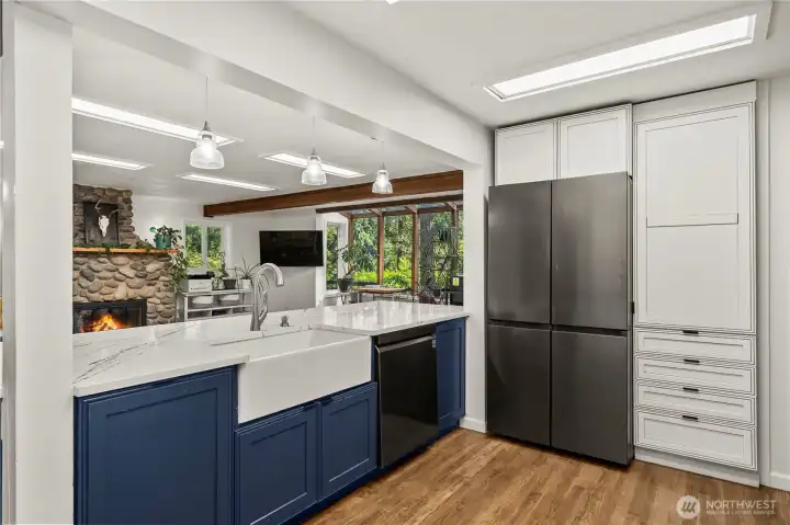 Kitchen is in the center of the home. Great for entertaining--inside or out!