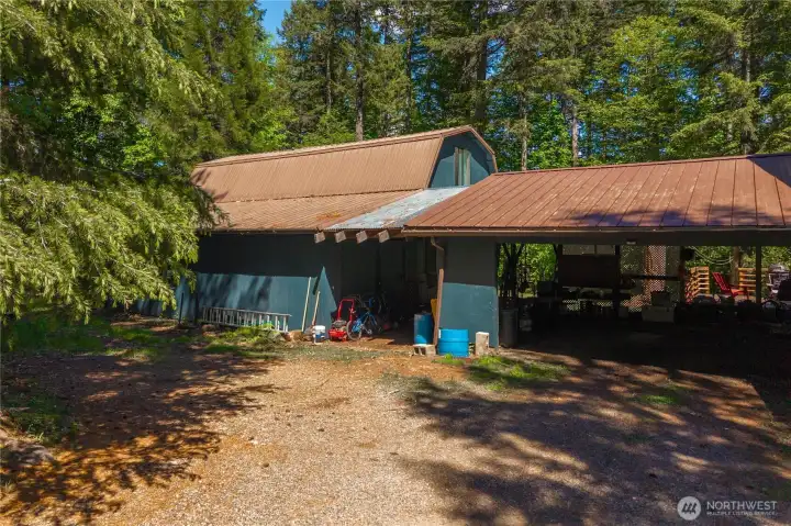Carport, shop, studio & enclosed flex space-currently a sports training/gym facility