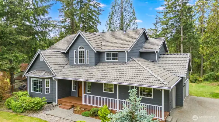 Welcome to this beautifully maintained 4-bedroom home in Nisqually Highlands.