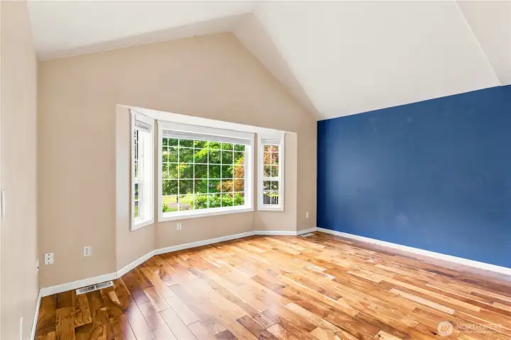 Spacious primary bedroom offering comfort and privacy.