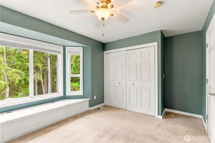 Additional 2 bedroom with large windows overlooking the yard.