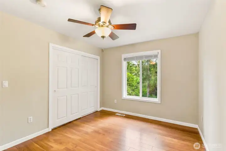 Comfortable guest 3 bedroom with ample closet space.