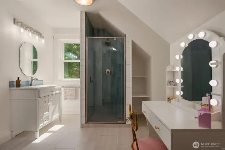 Beautifully updated bath with designer finishes and spacious accommodations for family and guests.