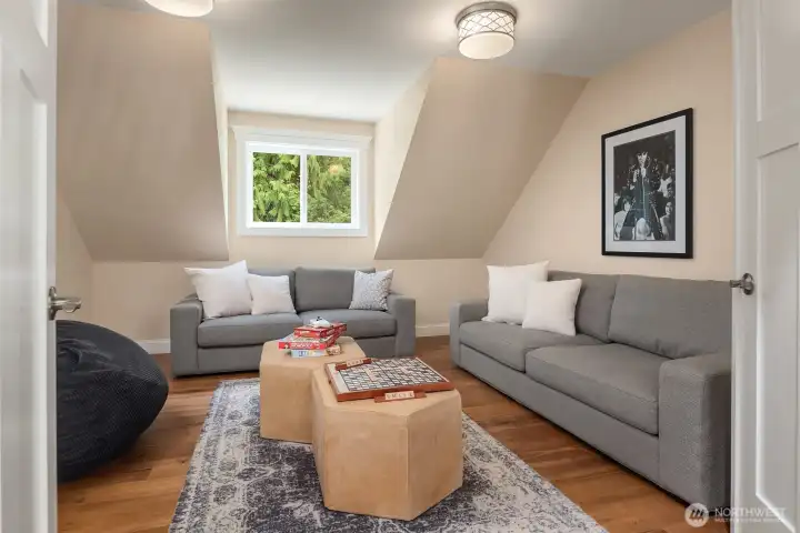 Flexible bonus room ideal for a media room, playroom, teen lounge, home office, or additional living space.
