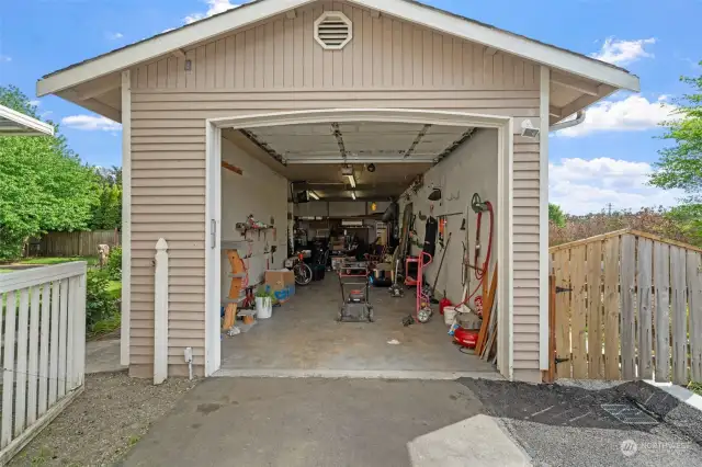This garage is bigger than it looks! It is wider in the back to add a shop area-two cars deep.  Has had a boat inside~