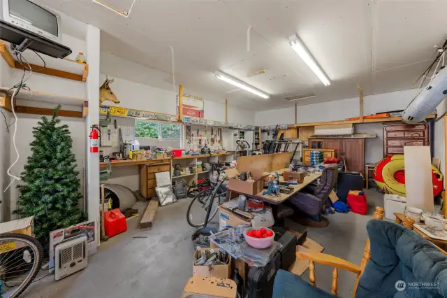 This is the back part of the garage.  There is a workbench and shelving.  You will love the Christmas tree nook!