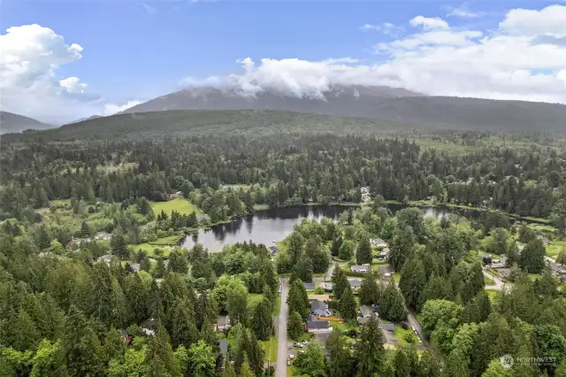 From high above the house looking towards the lake. Active Glenhaven Lakes community; well maintained amenities. Clubhouse, seasonal swimming pool, tennis, trails, playgrounds, parks, boat launch and fishing...