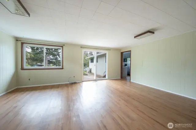 Family room with sliding doors to south facing patio