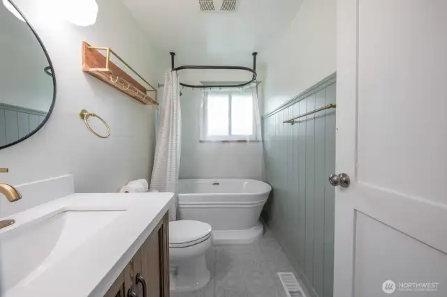 Completely updated  main bath with soaking tub/shower.