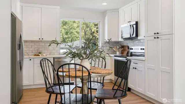 Photos for reference only. Same floor plan similar features. kitchen with eating space.