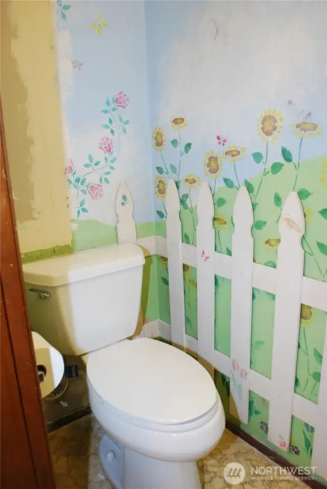 Half bath off laundry room next to family room.