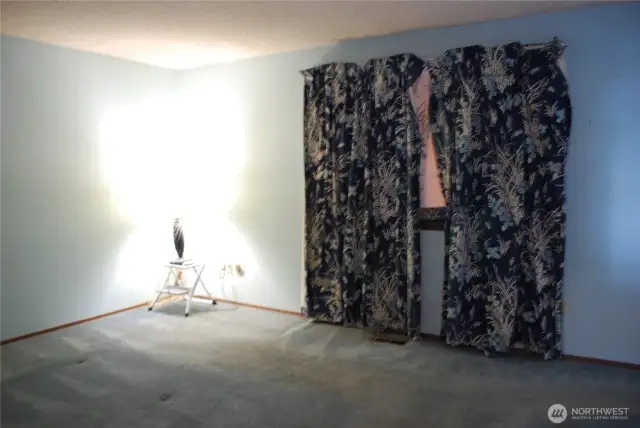 Primary bedroom features a 3/4 bath and a walk-in closet.