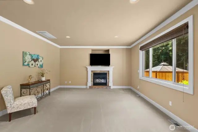 TV / Entertainment room  by Kitchen feel like open concept, 2nd gas firelplace