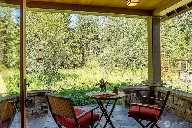 Landscaped English-style garden adds color and seasonal joy. Heated back deck extends your outdoor living season.