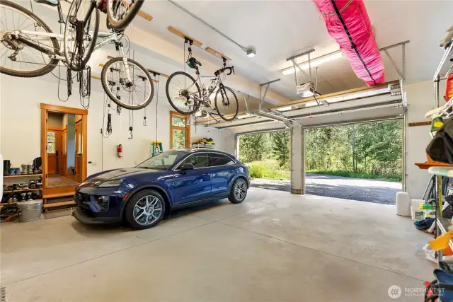 EV-ready two-car garage with finished interior and dual doors.