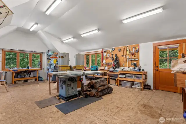 672 SF unfinished (fire taped) area over garage—ideal for hobbies.