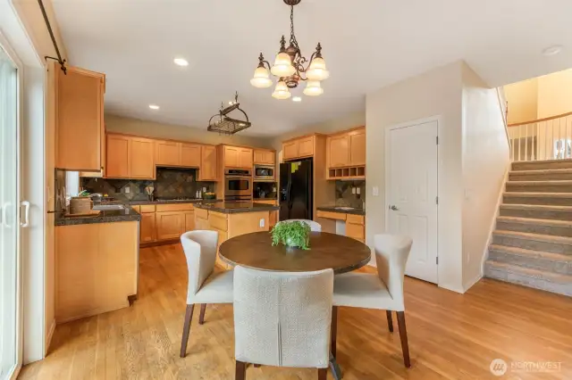 kitchen dinning space with slider to rear deck.