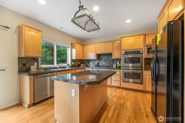 Large kitchen with plenty of storage.