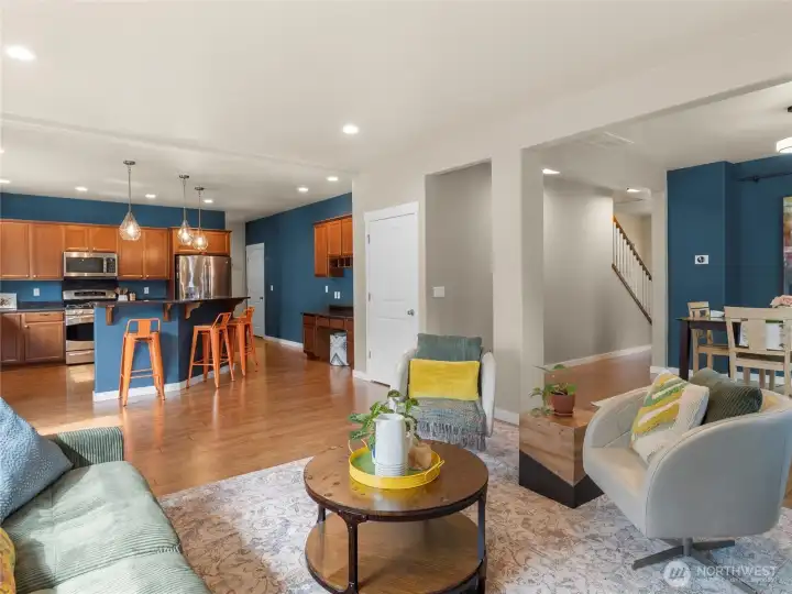 Looking from the family room into the kitchen. The near door on the right leads to the full basement and the far door leads to the3-car garage.