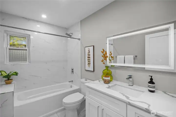 Shared upstairs bath with custom heated tile floors