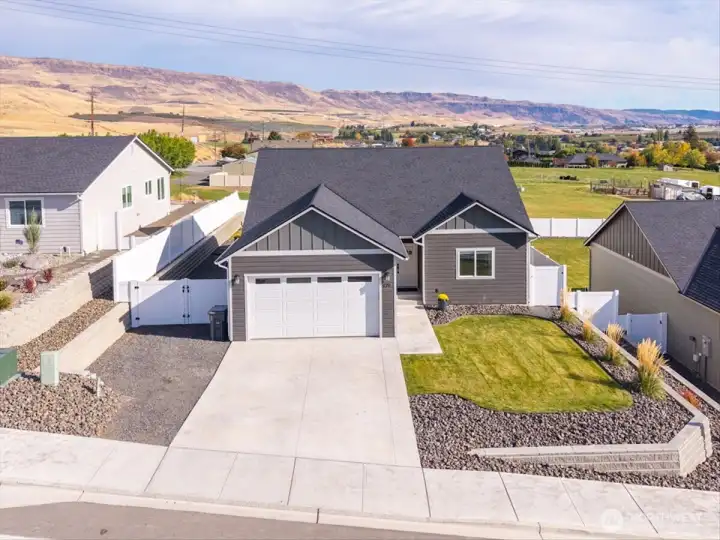Better than new—with standout curb appeal, extra parking space and sweeping views!