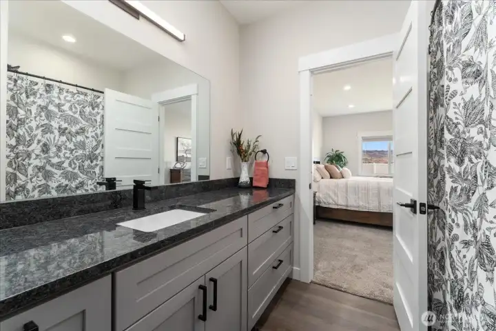 Stylish primary bath offering ample space and comfort.