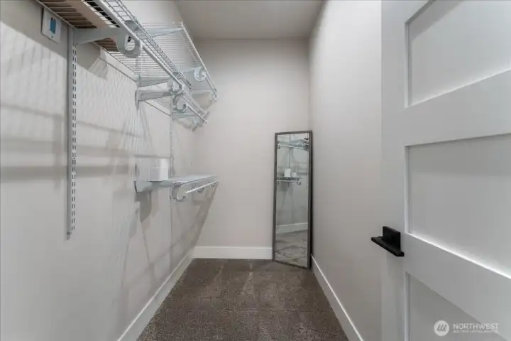 Primary walk-in closet.
