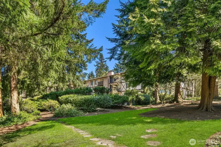 Complex landscaping is mature, lush and seasonally colorful.