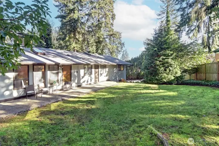 Flat, level, private gardened lot w/ slope on NE corner of Driveway - see topo map.