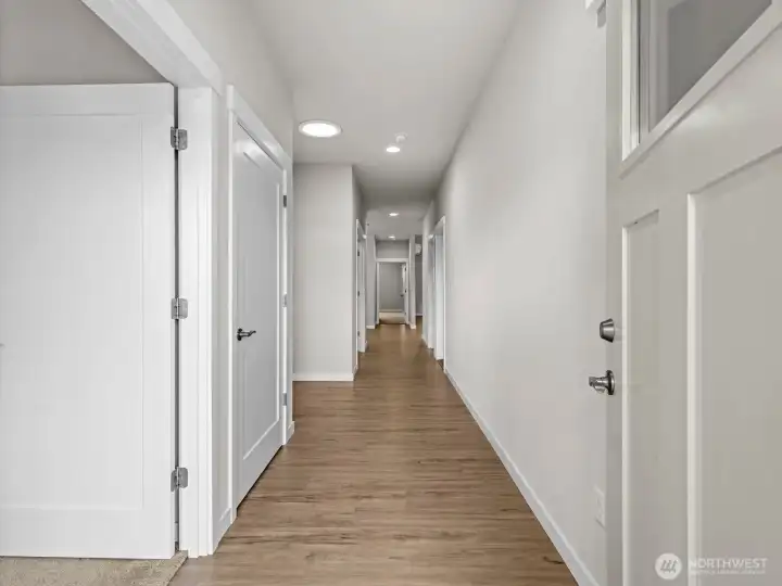 As you enter, beautiful LVP leads you into the 1st bedroom immediately on the left.