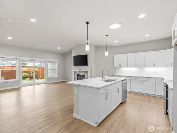 The open great room has vaulted ceilings.