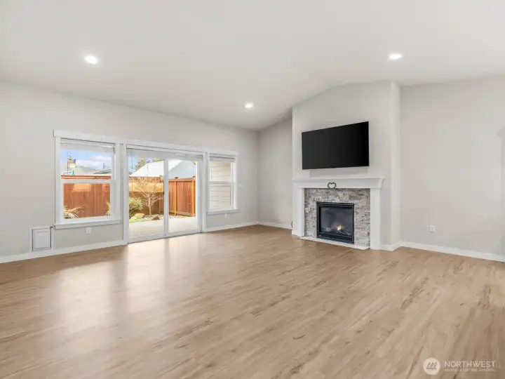 Large windows allow an abundance of natural light to filter through the home.