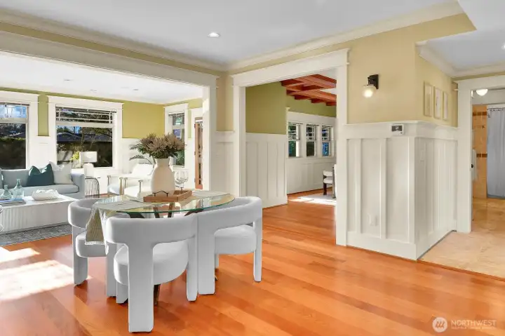 Open area on main level currently staged as informal dining space