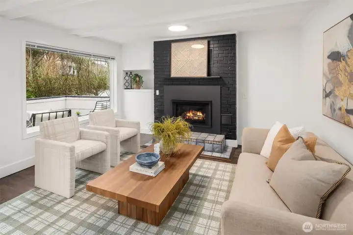 Gas fireplace provides wonderful warmth throughout the main floor and is connected to its own thermostat.