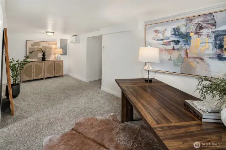 Rec room looking south. Note ductless heat pump for A/C and heat.