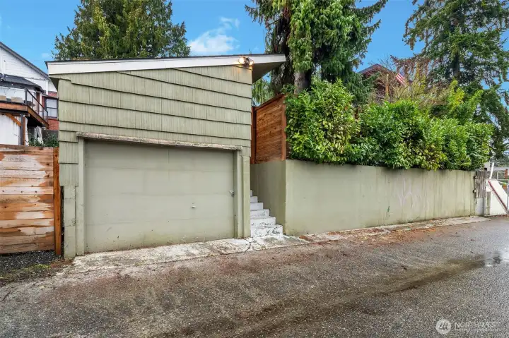 Detached garage off the alley. Upper level in garage is for storage and has its own door.