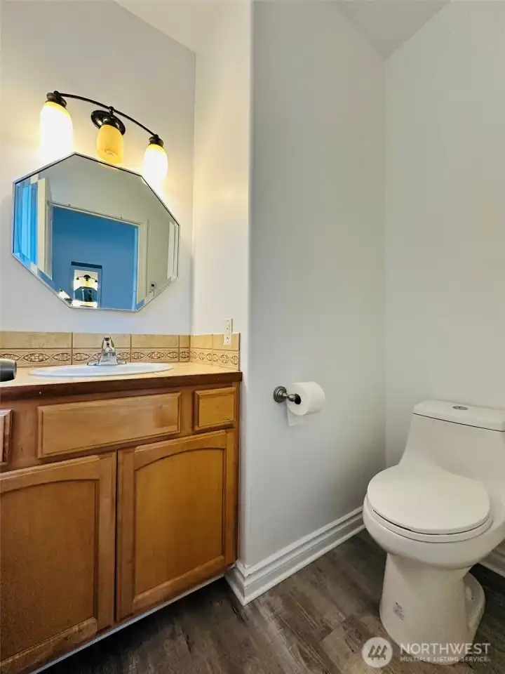 1/2 bath on main floor off of kitchen