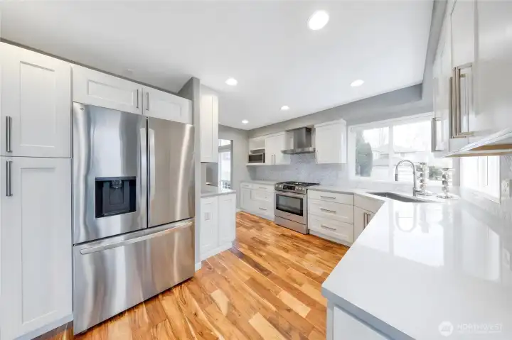 Expansive, top-of-the-line Chef’s kitchen with premium appliances.