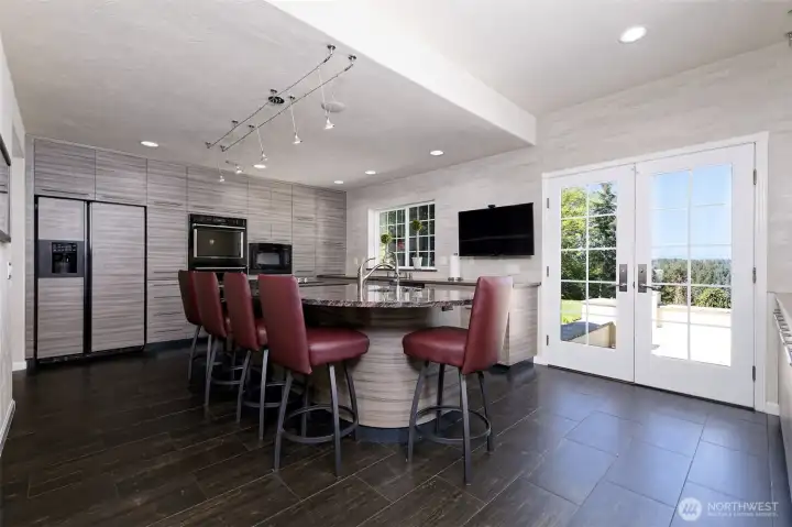 Beautiful, completely updated kitchen and tons of storage! French doors lead out to a really nice stamped-concrete patio.