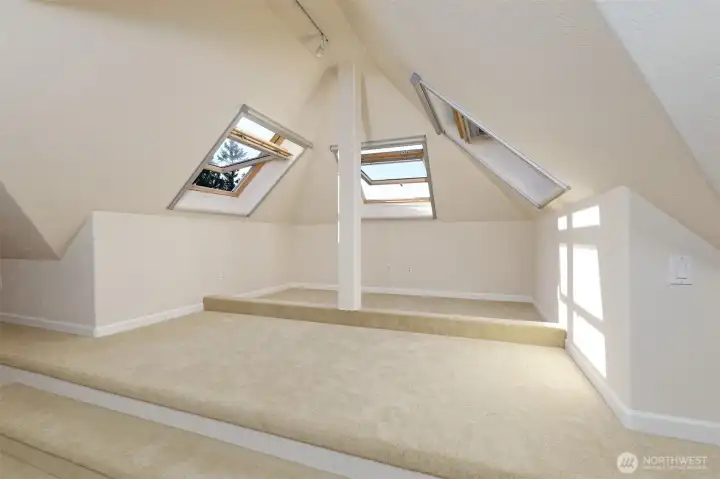 The 3rd floor room - it has all these high-end Milgard windows that you can rotate to easily clean both sides of the window!  They also have screens and pull-down shades. This room is so light and airy!