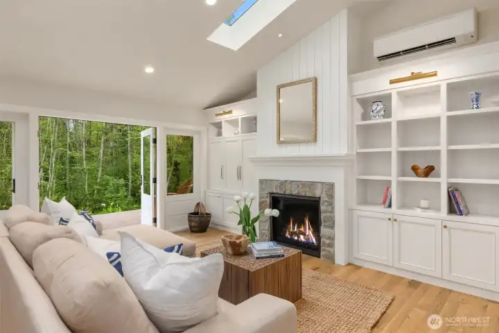 Find custom painted cabinetry and built-in shelving throughout the home.