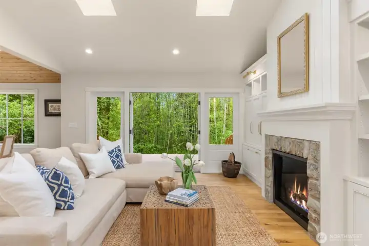 An abundance of windows and skylights, plus a sunny lot, translate to exceptional light throughout the home.