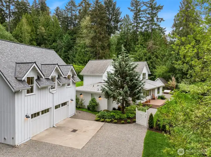 The detached garage has a footprint of 720 square feet, with ample room to park two cars, plus a storage closet with sink for washing up after projects.