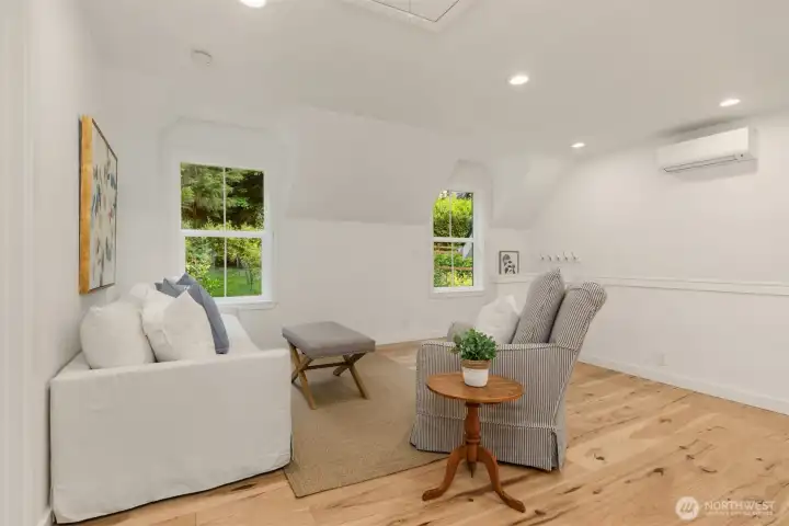 Above the garage, find approximately 700 square feet of finished space that is in keeping with the main house.