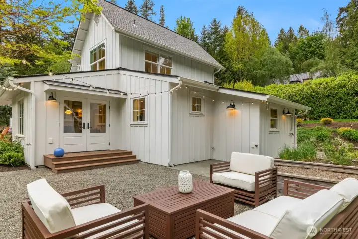 Enjoy the sunny property with this 'outdoor room'. Note the raised garden beds adjoining this space, plus an outdoor shower.