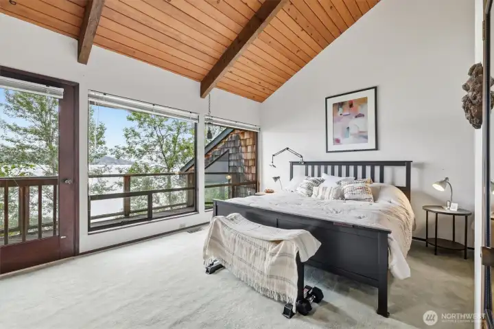 Primary bedroom with double closet access to private deck plus adjacent full bath Primary bedroom with double closet access to private deck plus adjacent full bath