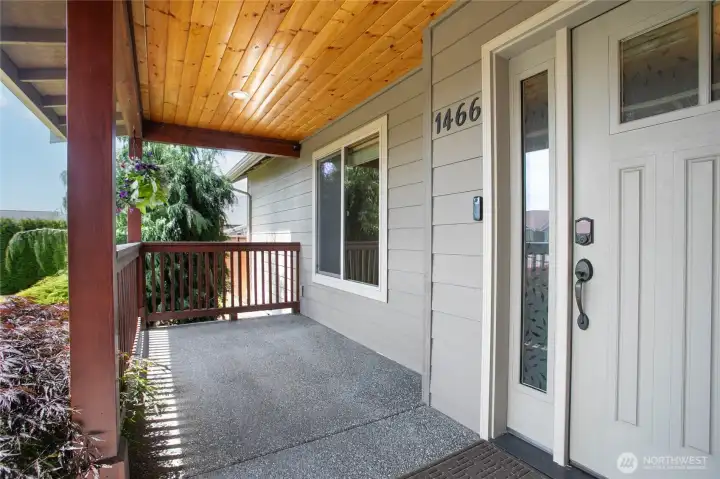 Roomy covered front porch with cedar ceiling. Roomy covered front porch with cedar ceiling.
