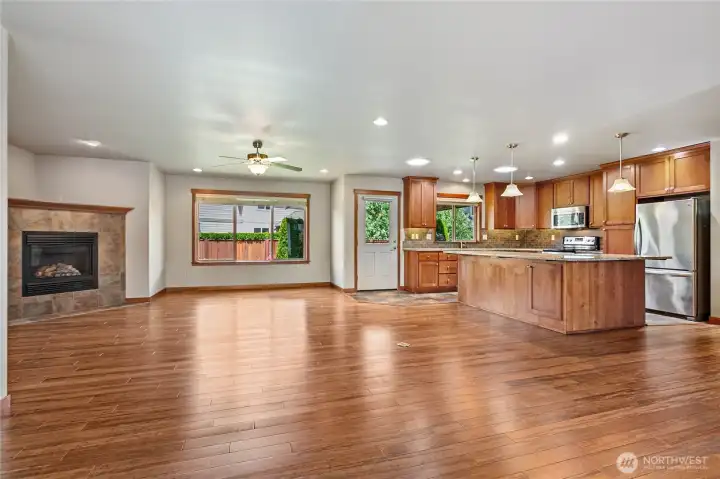Large kitchen with generous size island for casual dining. Large kitchen with generous size island for casual dining.