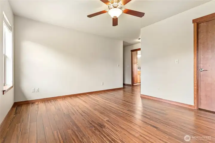 Primary bedroom with hardwood floors, walk in closet and full bath. Primary bedroom with hardwood floors, walk in closet and full bath.