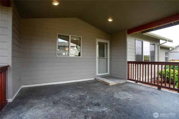 Generously sized covered back patio for year round enjoyment. Generously sized covered back patio for year round enjoyment.